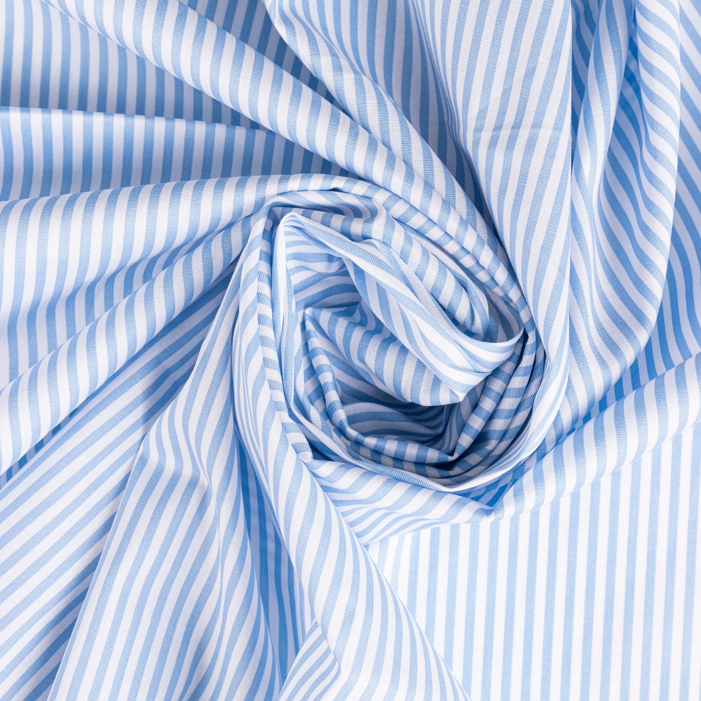 POPLIN CON LYCRA ESTAMPADO RAYADO CELESTE