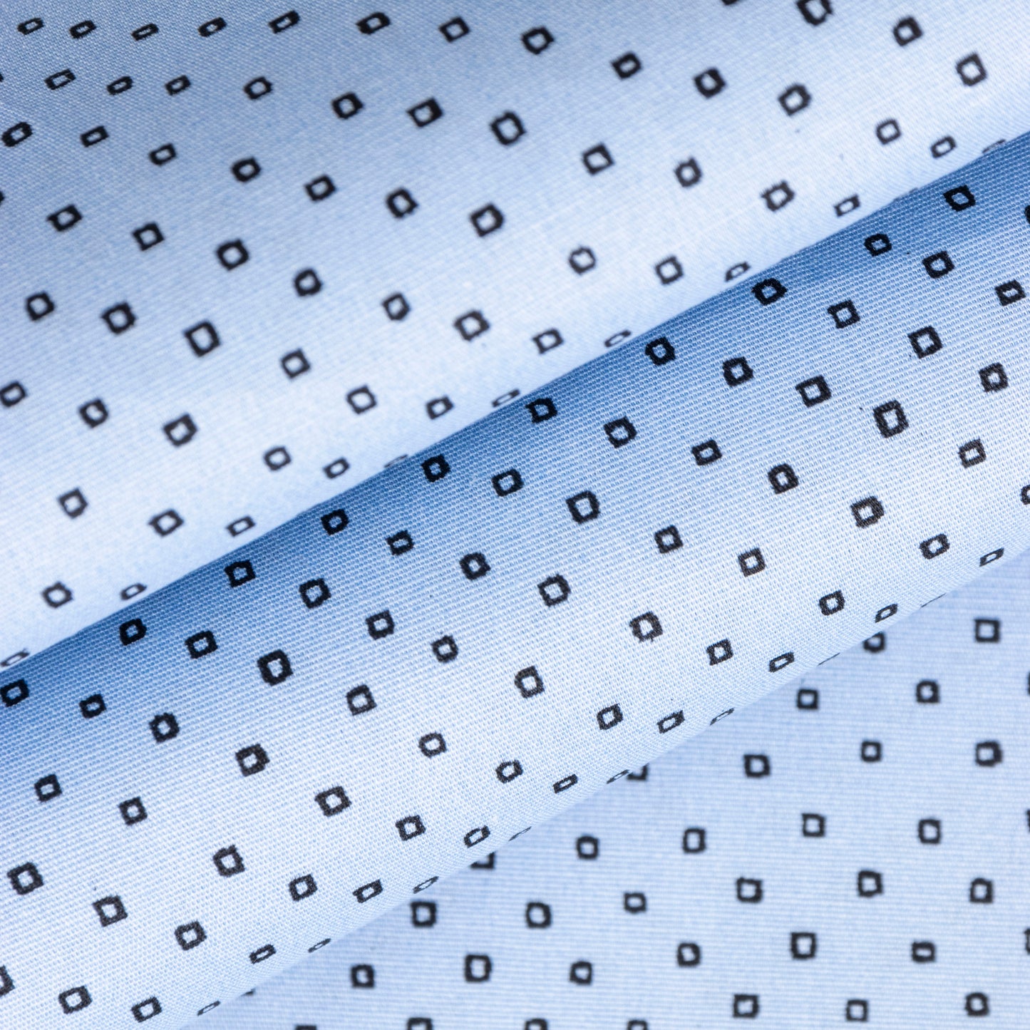 POPLIN CON LYCRA ESTAMPADO CUADRADO CELESTE